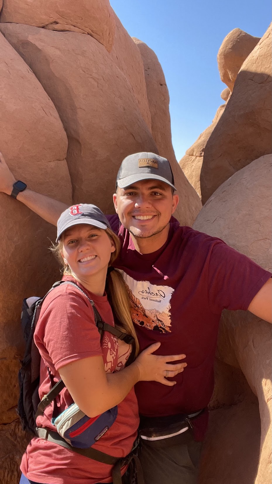 Skyler and wife hiking in red rock